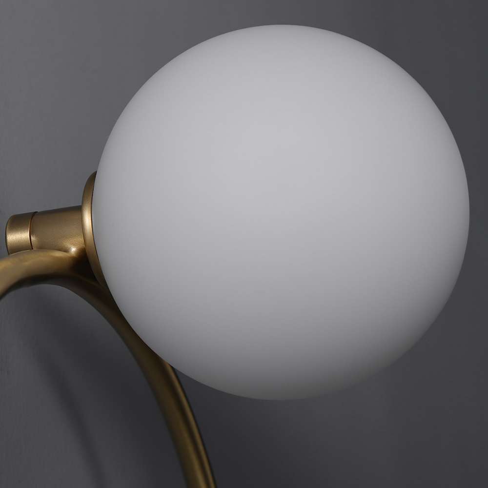 golden circular bedside lamp