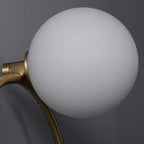 golden circular bedside lamp