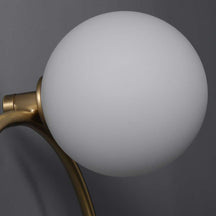 golden circular bedside lamp