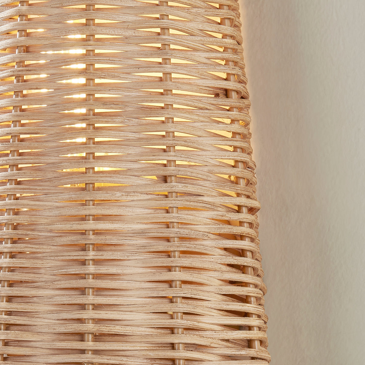 Naida Hand-Woven Rattan Wall Sconce with Aged Brass Pull