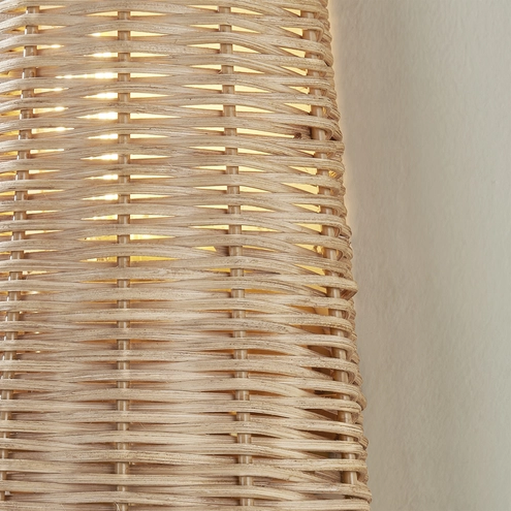 Naida Sconce | Hand-Woven Rattan Coastal Wall Sconce with Aged Brass Pull