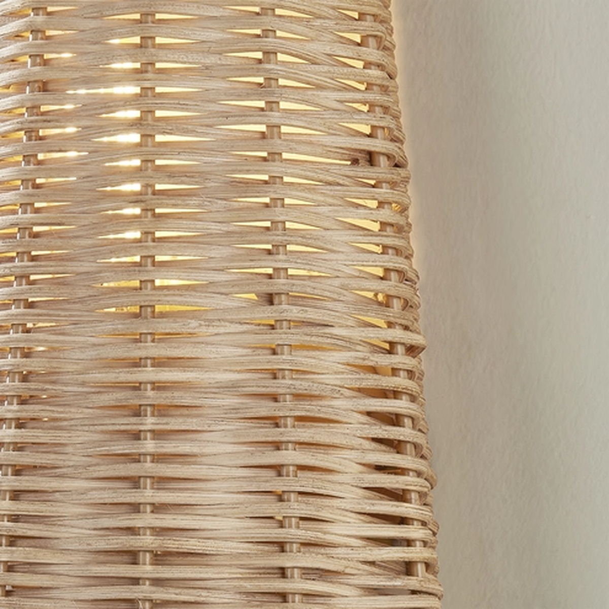 Naida Sconce | Hand-Woven Rattan Coastal Wall Sconce with Aged Brass Pull