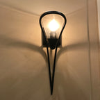 black olympia 1 light sconce