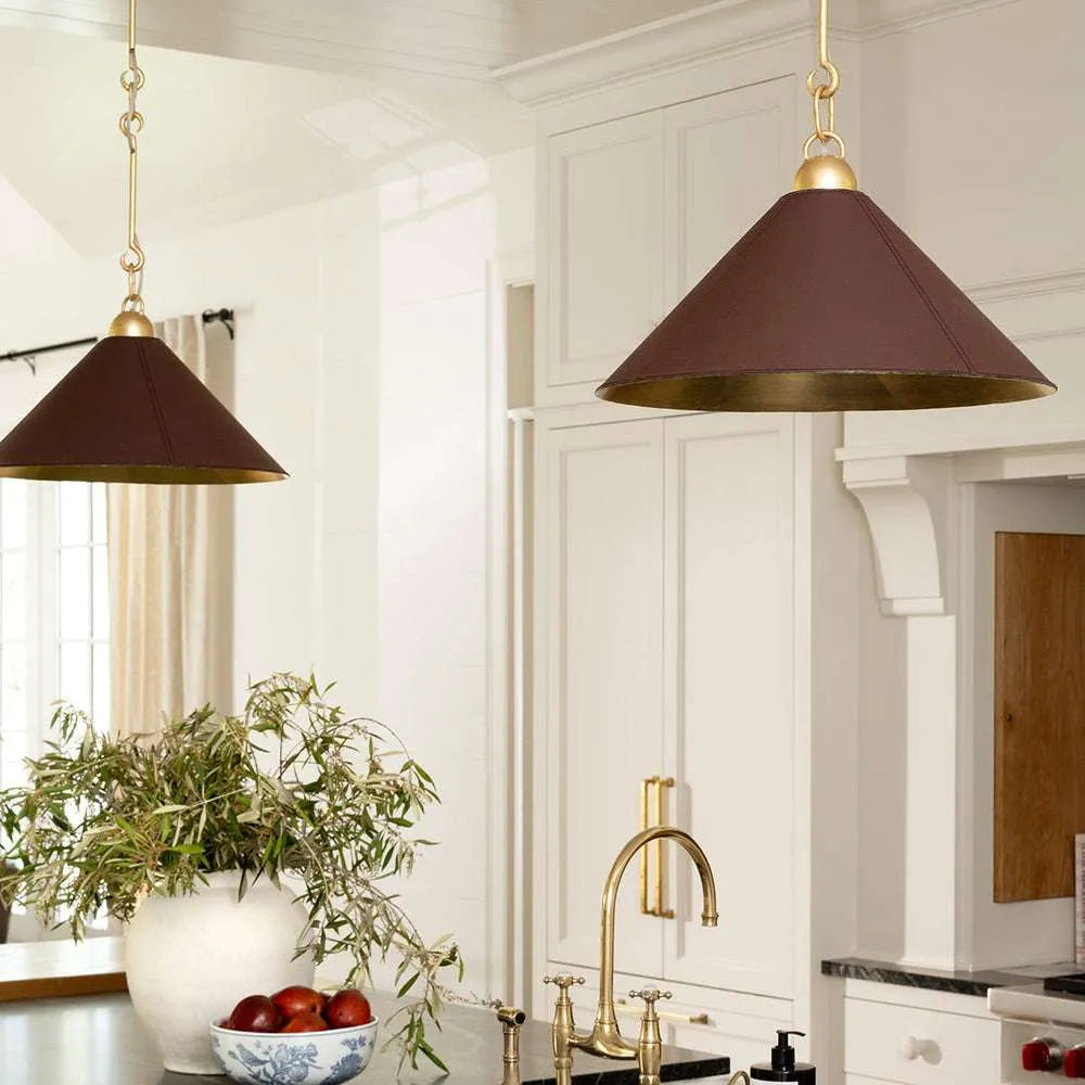 Scarlett Pendant dramatic jewel-toned coloured glass hanging light with bold warm glow over dining table in statement interior