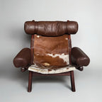 Swedish Cow Hide Armchair – Nordic Leather Accent Chair for Rustic Modern Decor