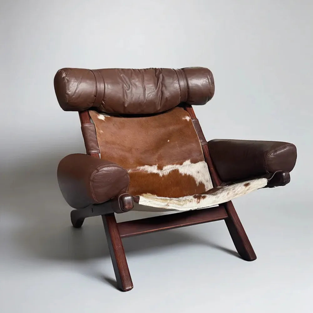 Swedish Cow Hide Armchair – Nordic Leather Accent Chair for Rustic Modern Decor