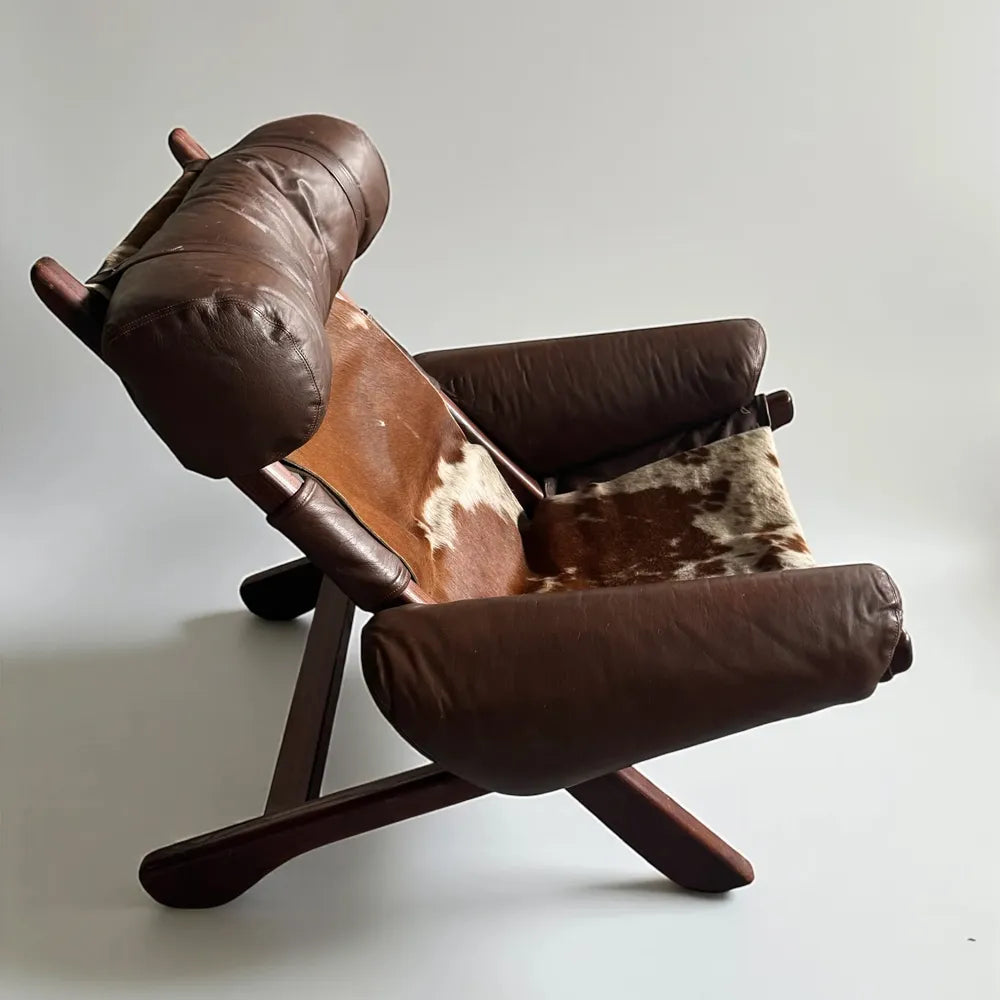 Swedish Cow Hide Armchair – Nordic Leather Accent Chair for Rustic Modern Decor