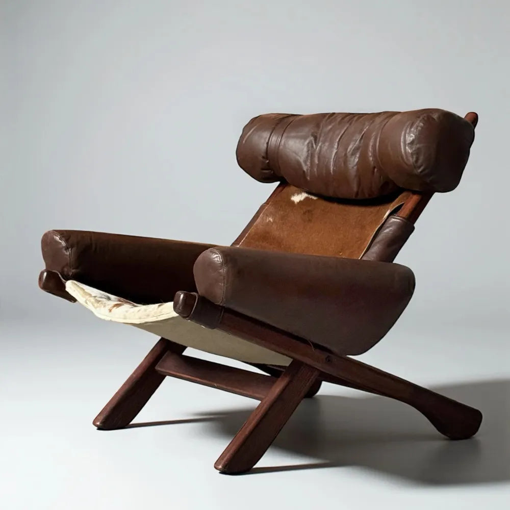 Swedish Cow Hide Armchair – Nordic Leather Accent Chair for Rustic Modern Decor