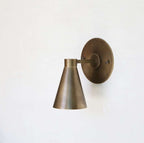 minimalist brass sconce
