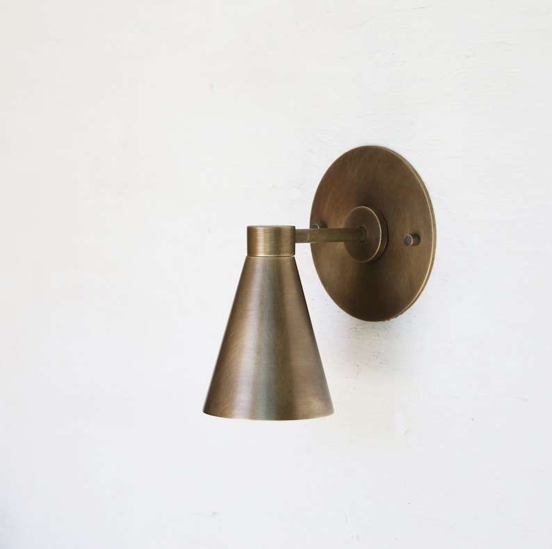 minimalist brass sconce