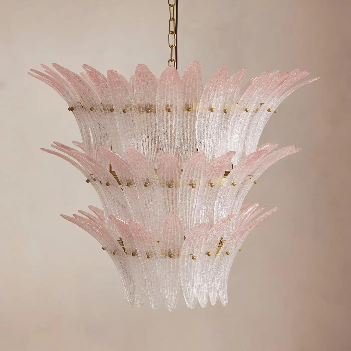 Treviso Chandelier Pink blush multi-arm ceiling light with warm crystal glow in elegant bedroom setting