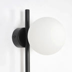 white globe wall fixture