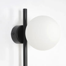 white globe wall fixture