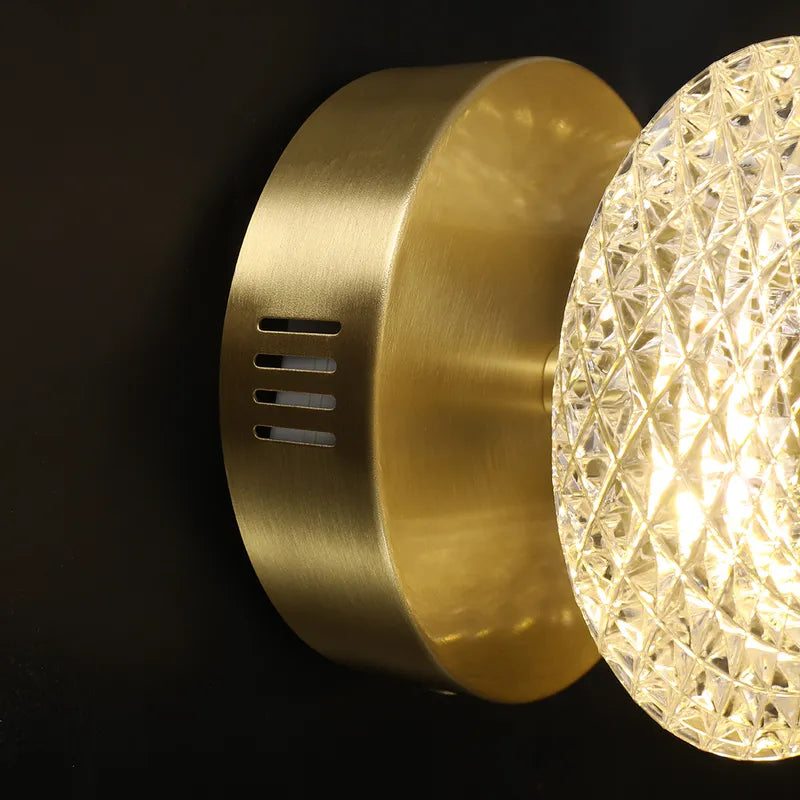 gold and clear shade sconce