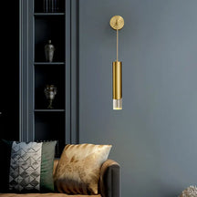 armed brass cylinder sconce